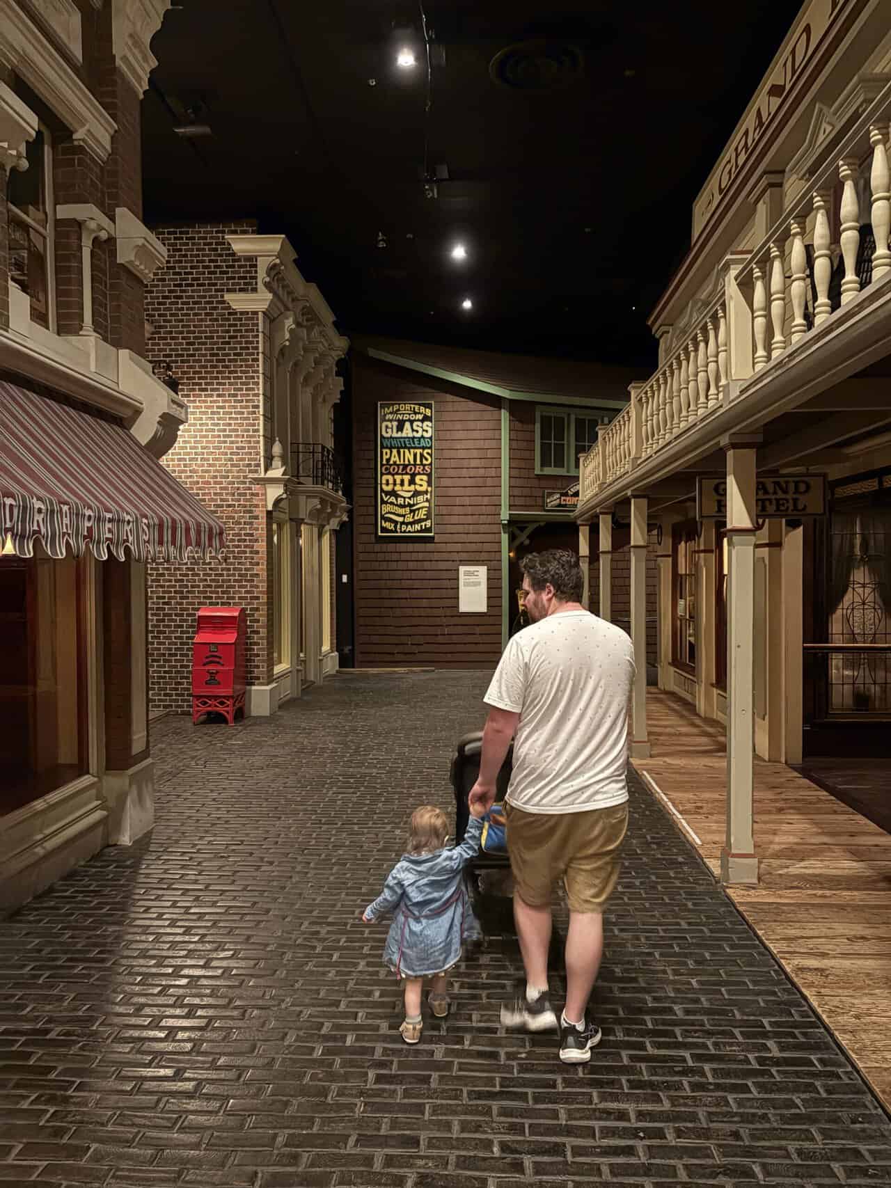Colin and C walking through Old Town at the Royal BC Museum