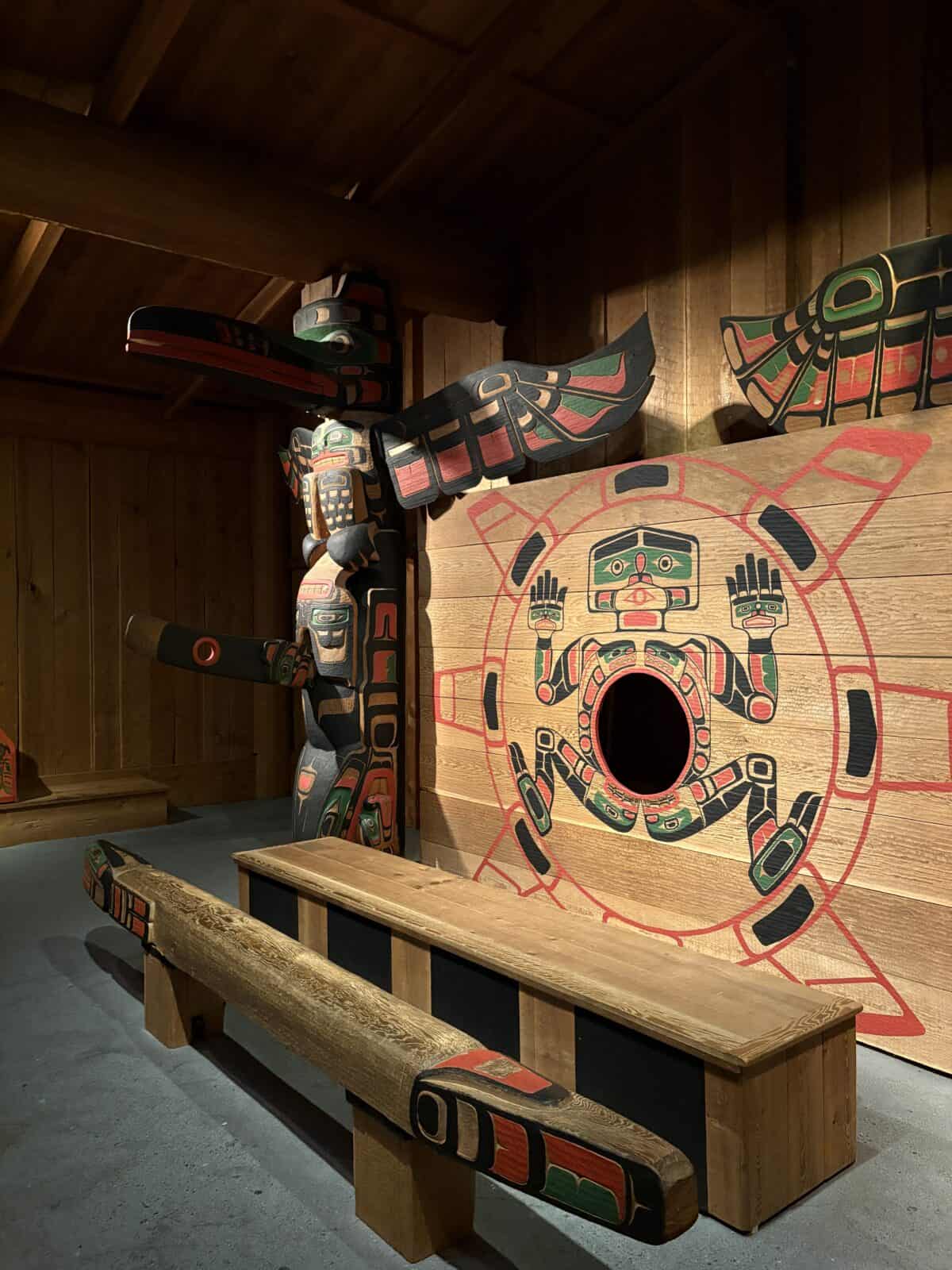 House posts and carvings in the Interior of Jonathan Hunt House at Royal BC Museum