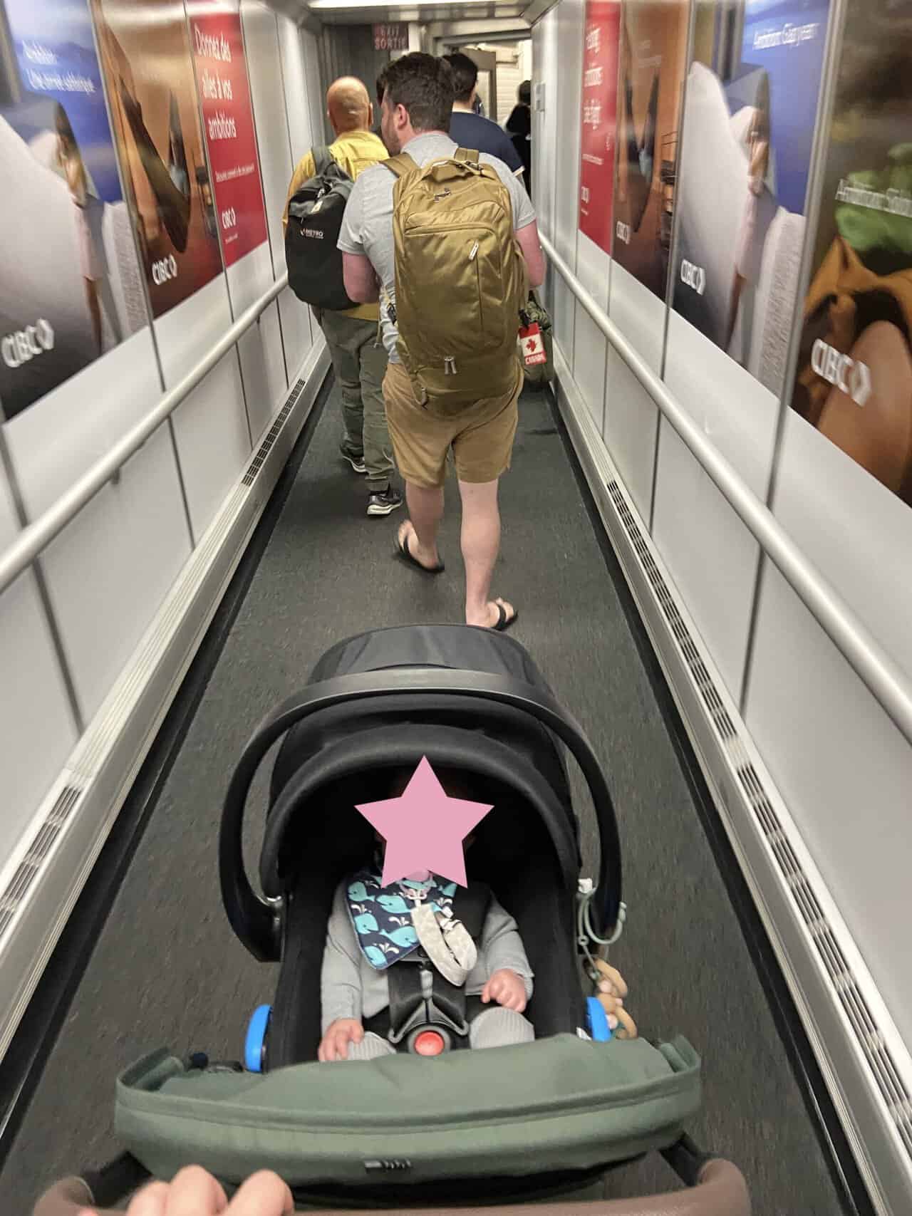 Tips for Flying With a Baby: From Booking to Baggage Claim 46 Walking down the ramp after deboarding baby's first flight to Toronto